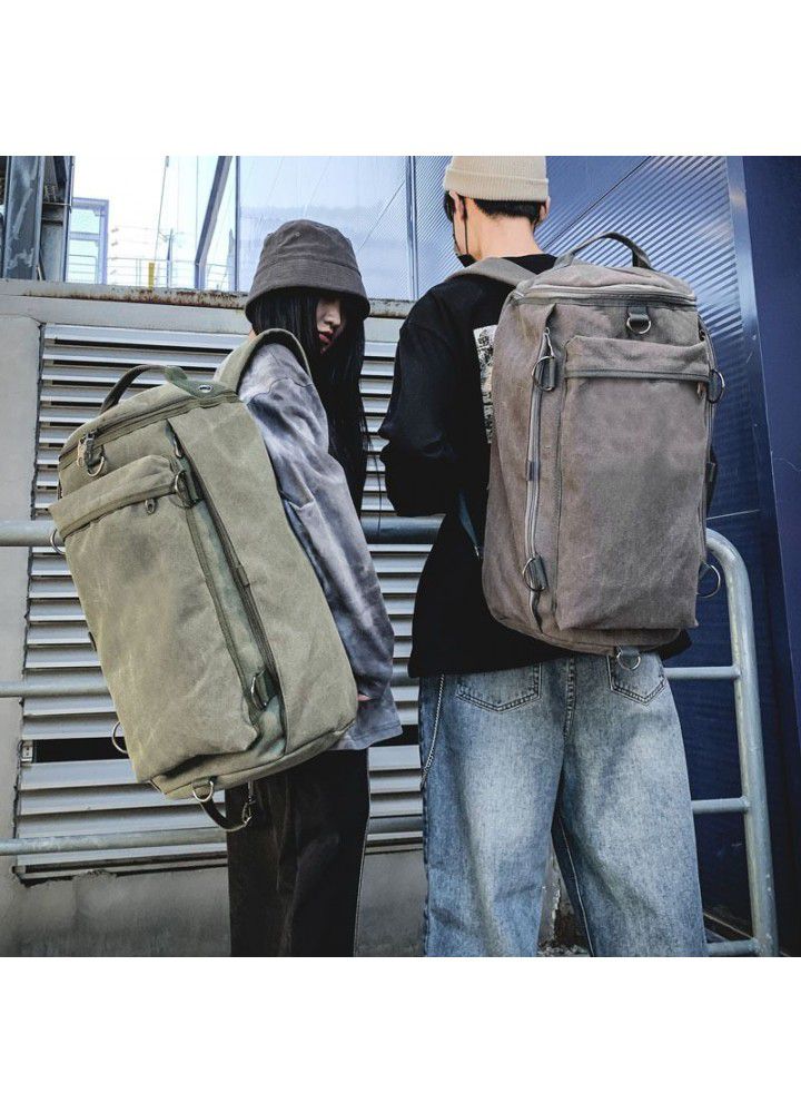 Fashion men's bag large capacity Travel Backpack men's outdoor travel sports cylinder backpack trend canvas bag 