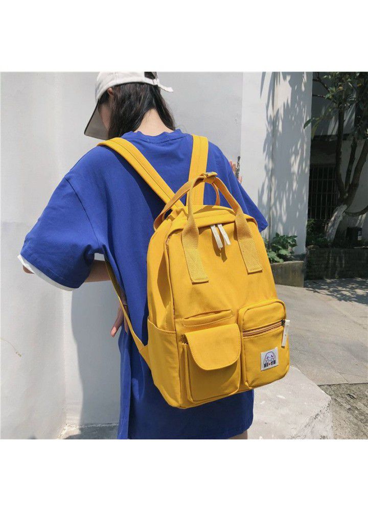 Canvas Backpack  new classic simple canvas wearable and lightening college style solid color student schoolbag 