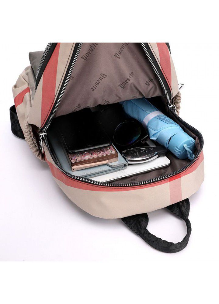 New light backpack stripe nylon bag women's leisure backpack fashion trend middle aged mother bag 