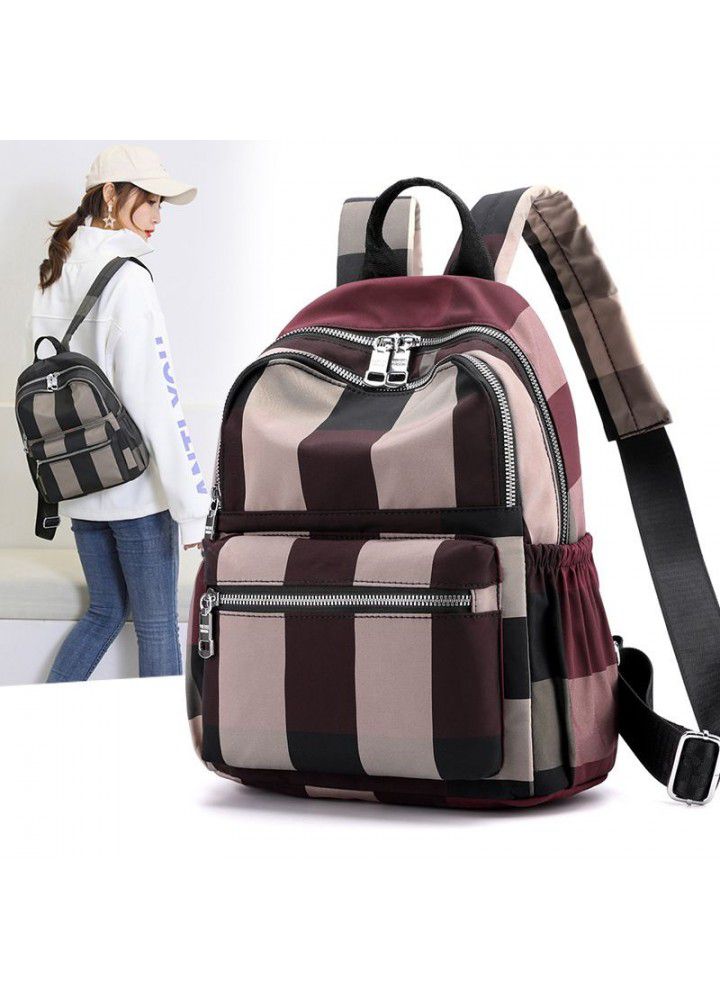 New light backpack stripe nylon bag women's leisure backpack fashion trend middle aged mother bag 