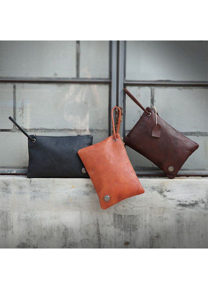 2020 new original hand-made vegetable tanning leather men's bag Japanese style retro leather hand grip bag head layer leather hand bag 