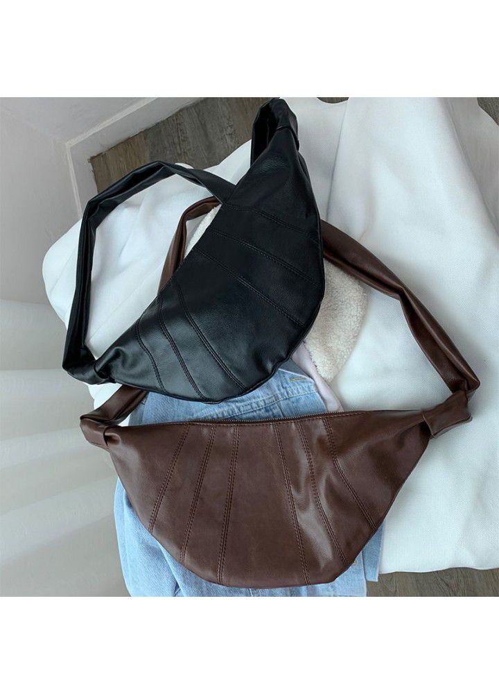 Jorge women's Retro Single Shoulder Messenger waist chest bag spring simple Pu large capacity horn bag spot bag women's fashion 