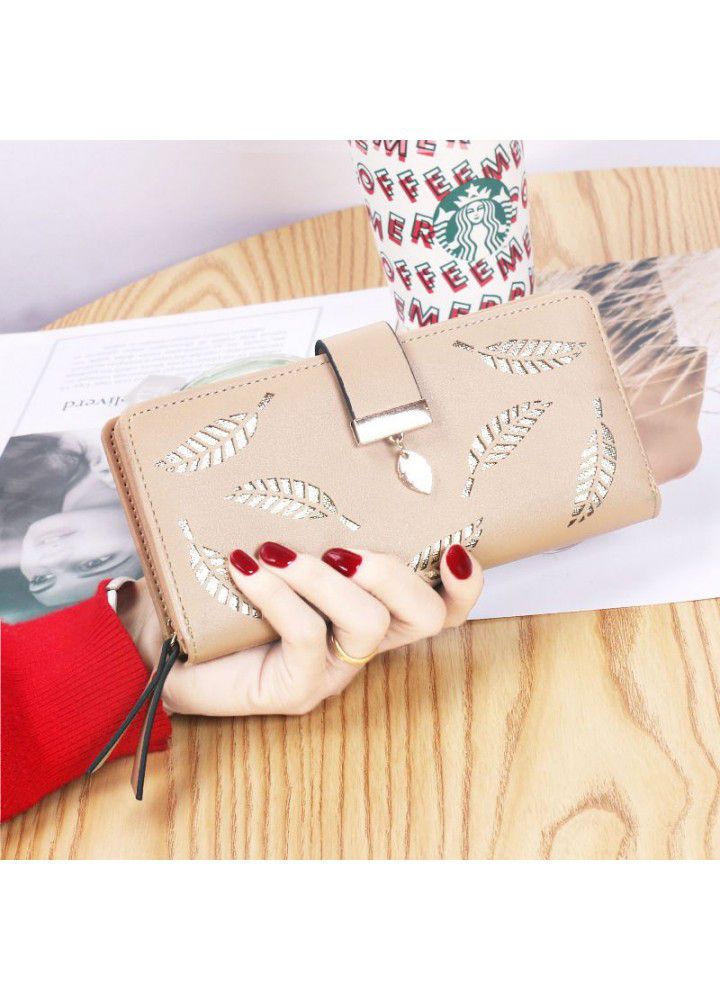  new women's wallet hollowed out leaf wallet wallet Korean version two fold zipper long card bag hand bag