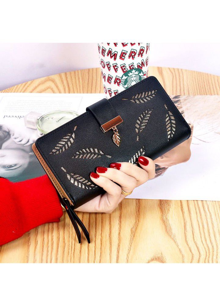  new women's wallet hollowed out leaf wallet wallet Korean version two fold zipper long card bag hand bag